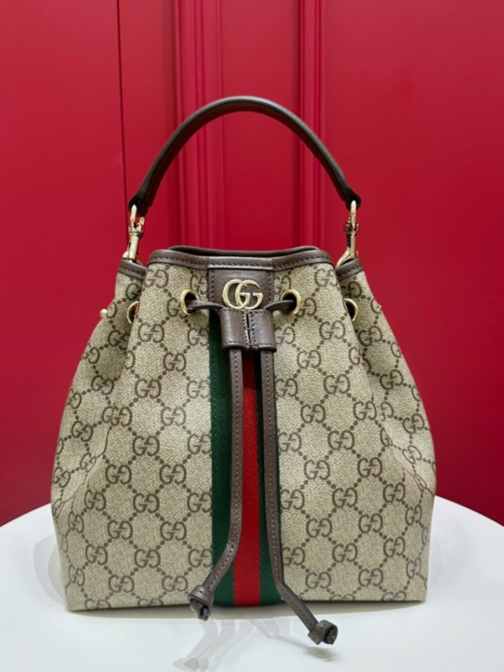 Ophidia small bucket bag in beige and brown GG fabric